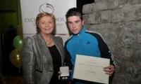 John Reilly receives his Award from Minister Fitzgerald