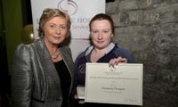 Shantelle Donegan receives her Award from Minister Fitzgerald