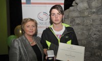 Daniel Donnelly receives his Award from Minister Fitzgerald