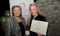 Ashley Power receives her Award from Minister Fitzgerald