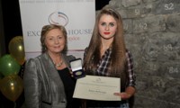 Eileen McDonagh receives her Award from Minister Fitzgerald