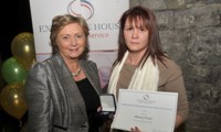 Nancy Power receives her Award from Minister Fitzgerald
