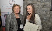 Christine Stokes receives her Award from Minister Fitzgerald